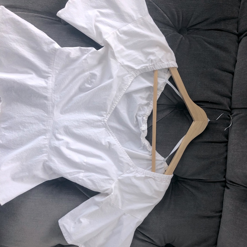 White peplum top